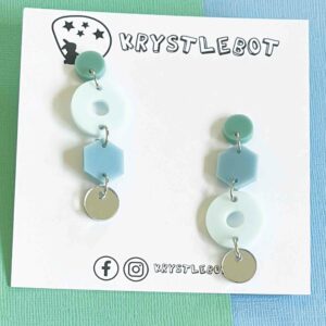 Blue and green tonal mismatched shape dangles with circles and pentagons
