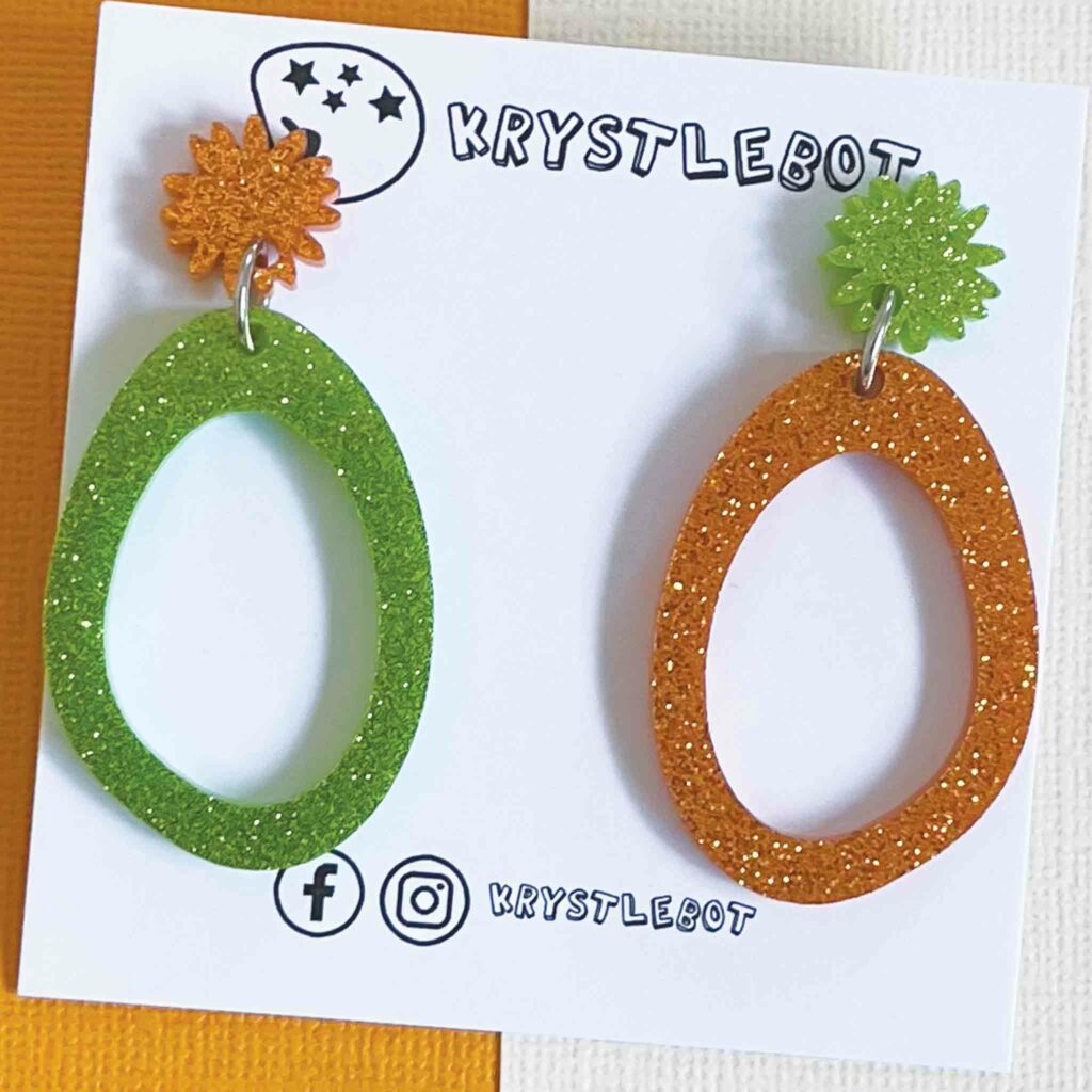 Orange and green mismatched oval dangles