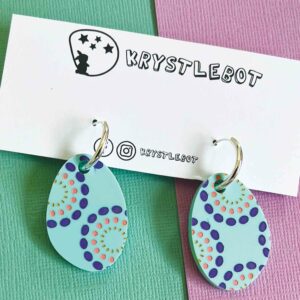 Mint ovals on a hoop with a hand painted burst pattern